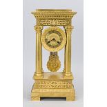 Empire portal clock, fire-gilt bronze, 2nd half 19th century, the base with floral tendril motifs,