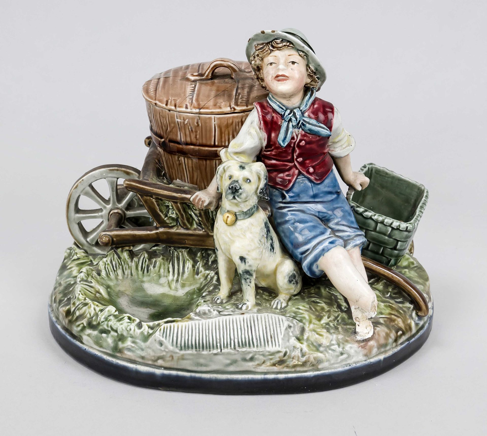 Faience smoking set, late 19th century, polychrome painted and glazed stoneware. Boy with dog