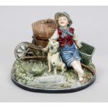 Faience smoking set, late 19th century, polychrome painted and glazed stoneware. Boy with dog