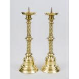 Pair of altar candlesticks, late 19th century, sheet brass. Twisted shaft with nodus on a profiled