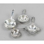 Four tea strainers, 20th century, hallmarked silver, various shapes and sizes, some with relief