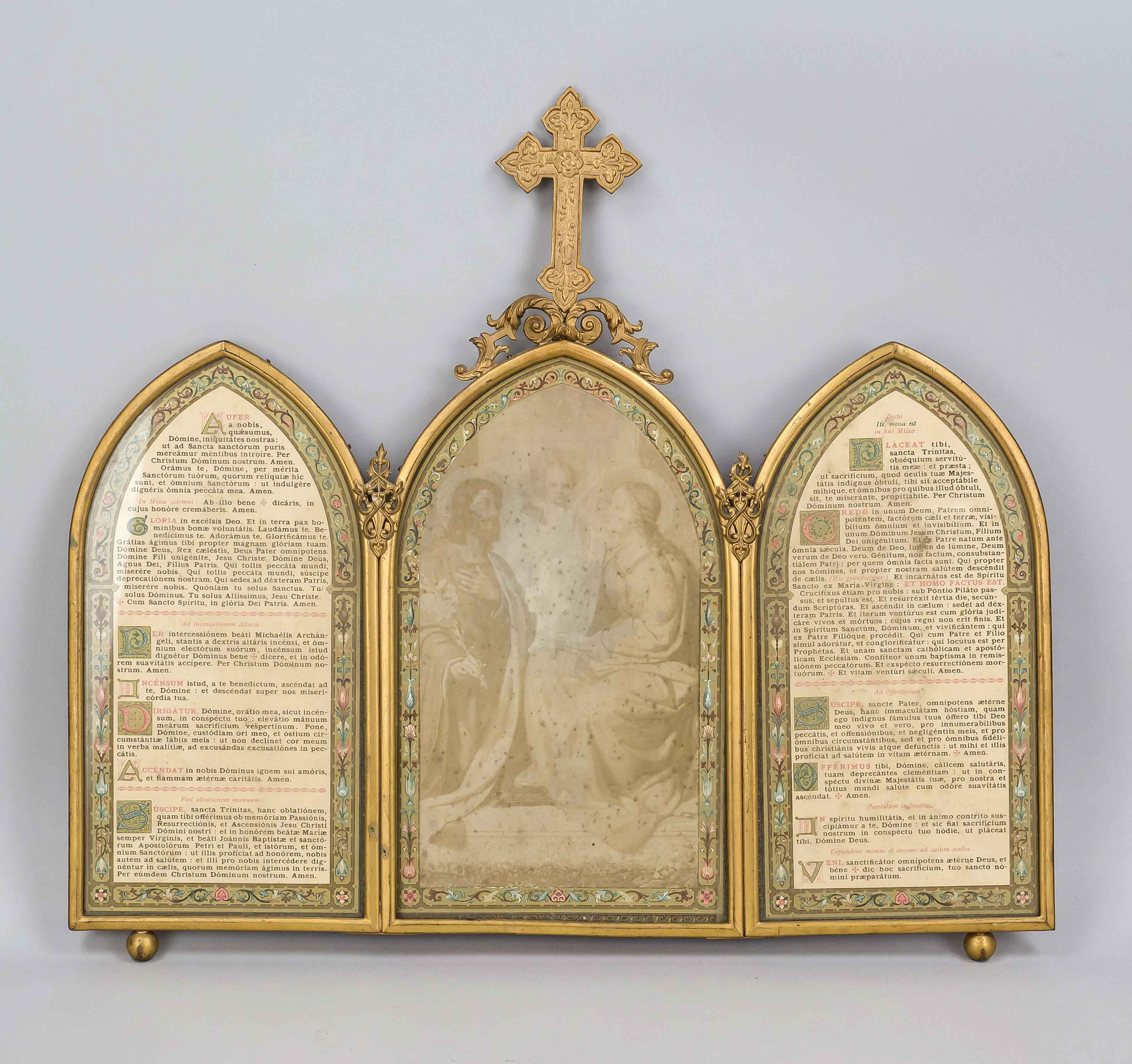 Canon triptych, early 20th century, brass frame, behind glass central portrait of the Holy Family (