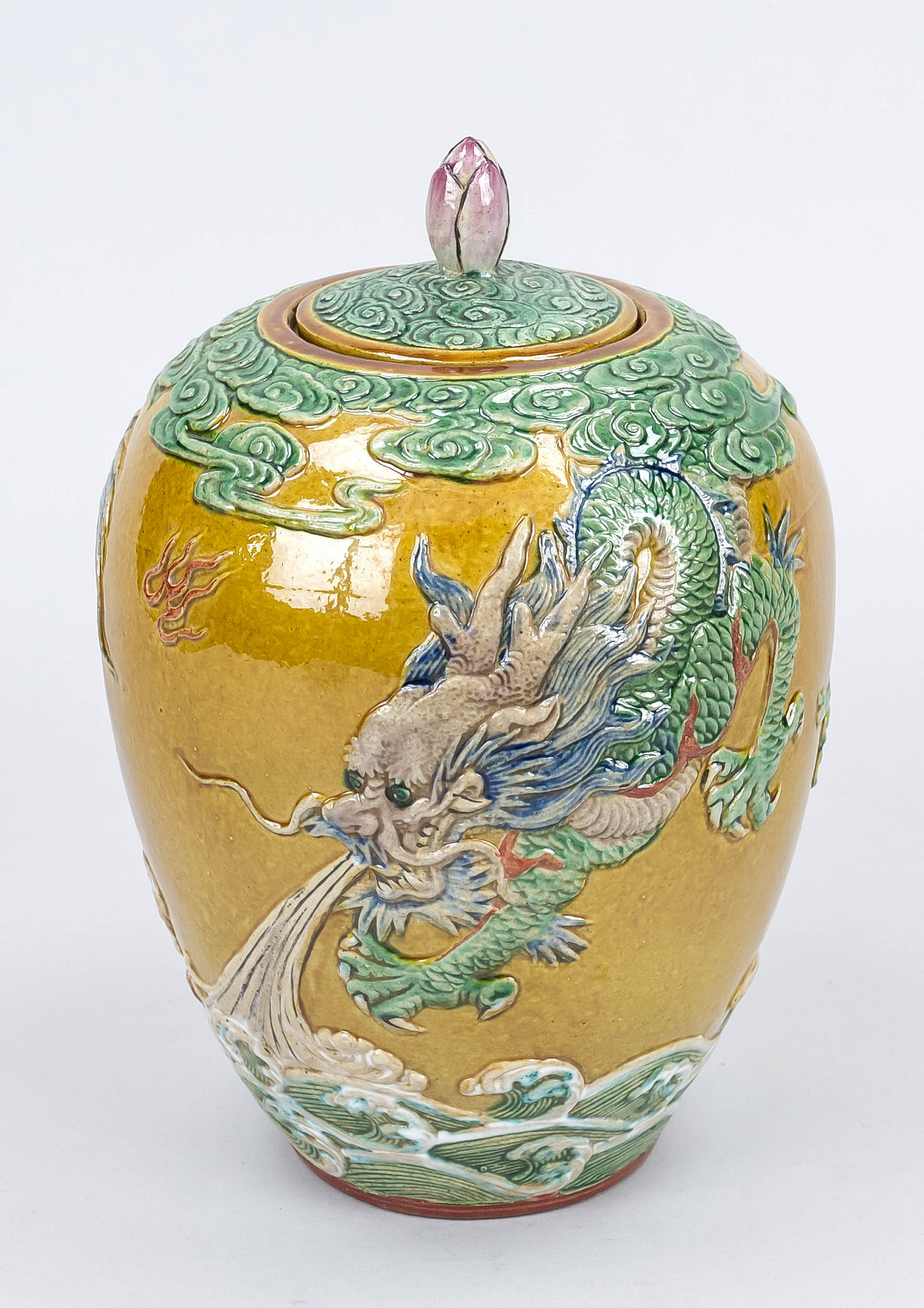 Dragon lidded pot, China 19th/20th century, polychrome relief decoration with dragon between