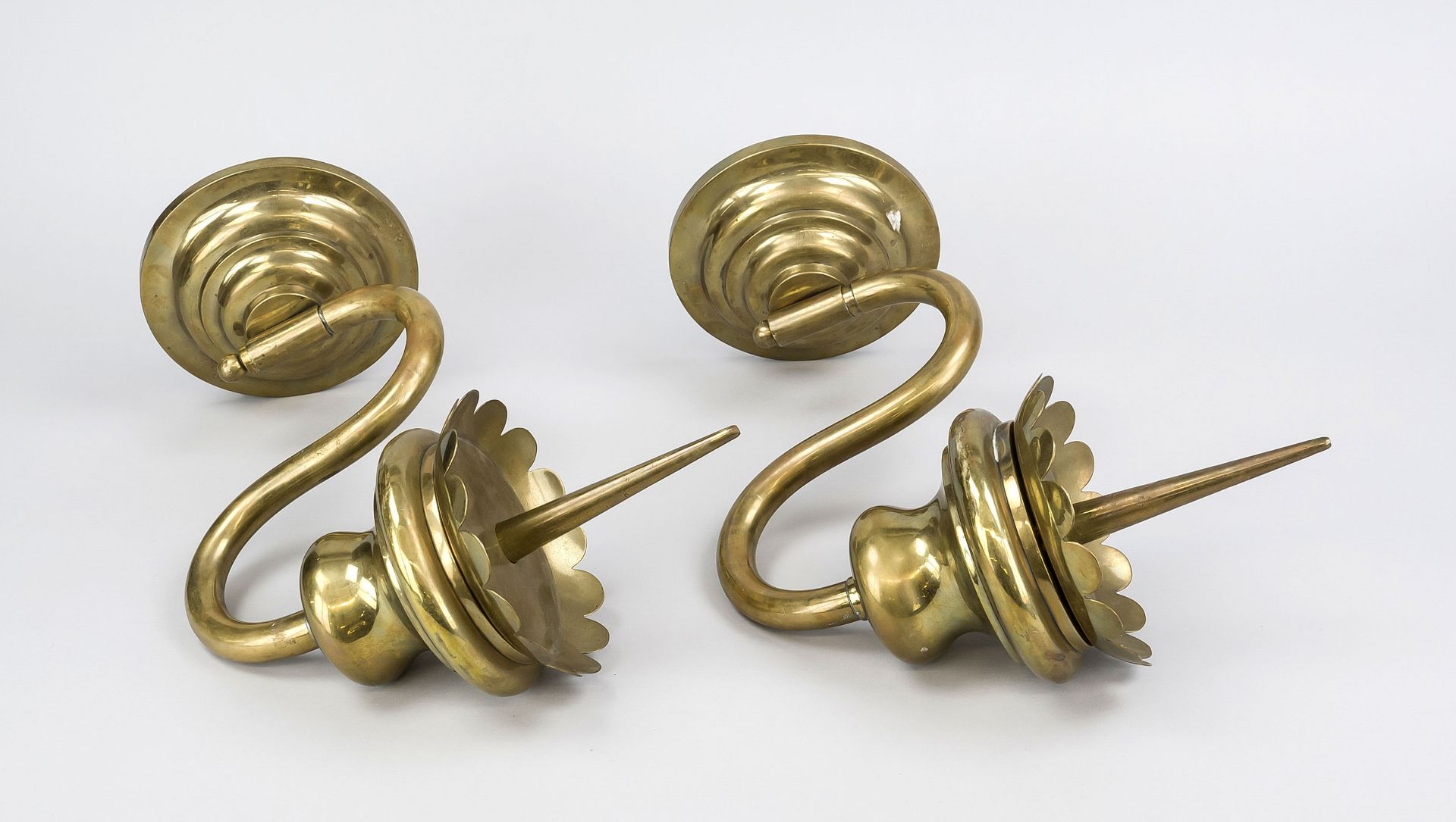 Pair of wall sconces, late 19th century, brass. S-bend candelabra arm inserted into round,