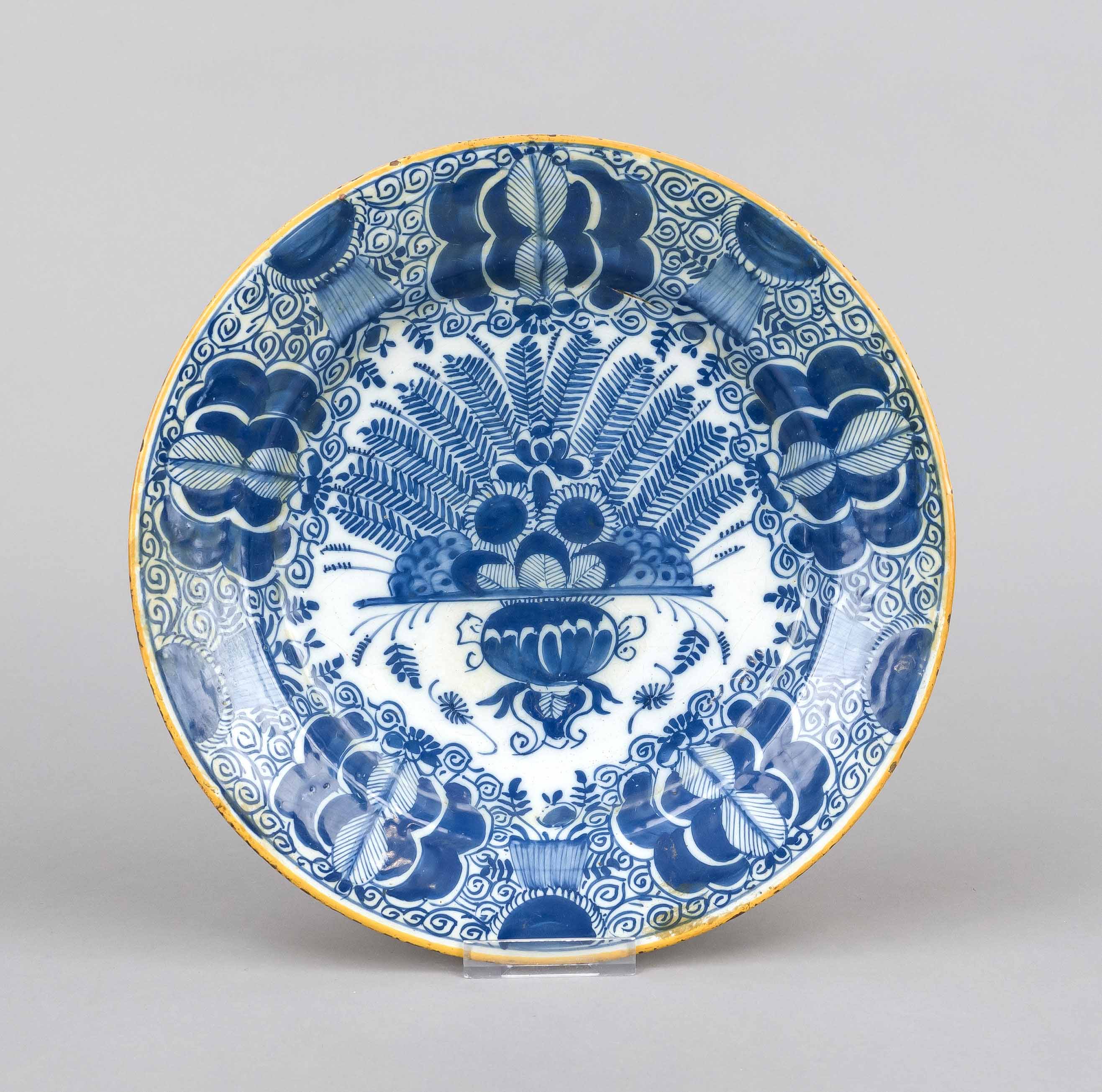 Plate, Delft workshops, De Porcelayne Claeuw, mark c. 1700, floral painting in underglaze blue,