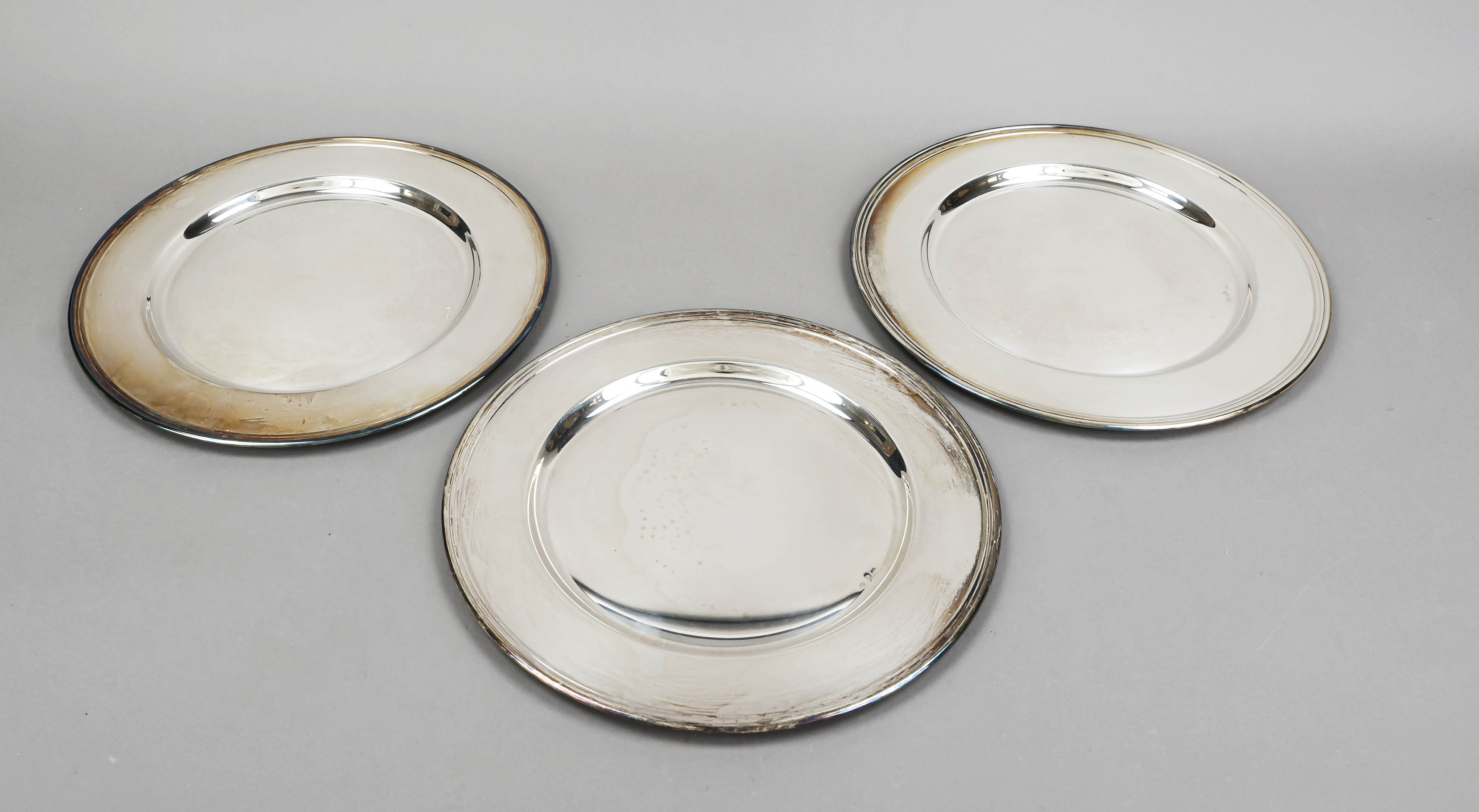 Eight place plates, Italy, 20th century, master's mark Antonio Braganti, Florence, sterling silver