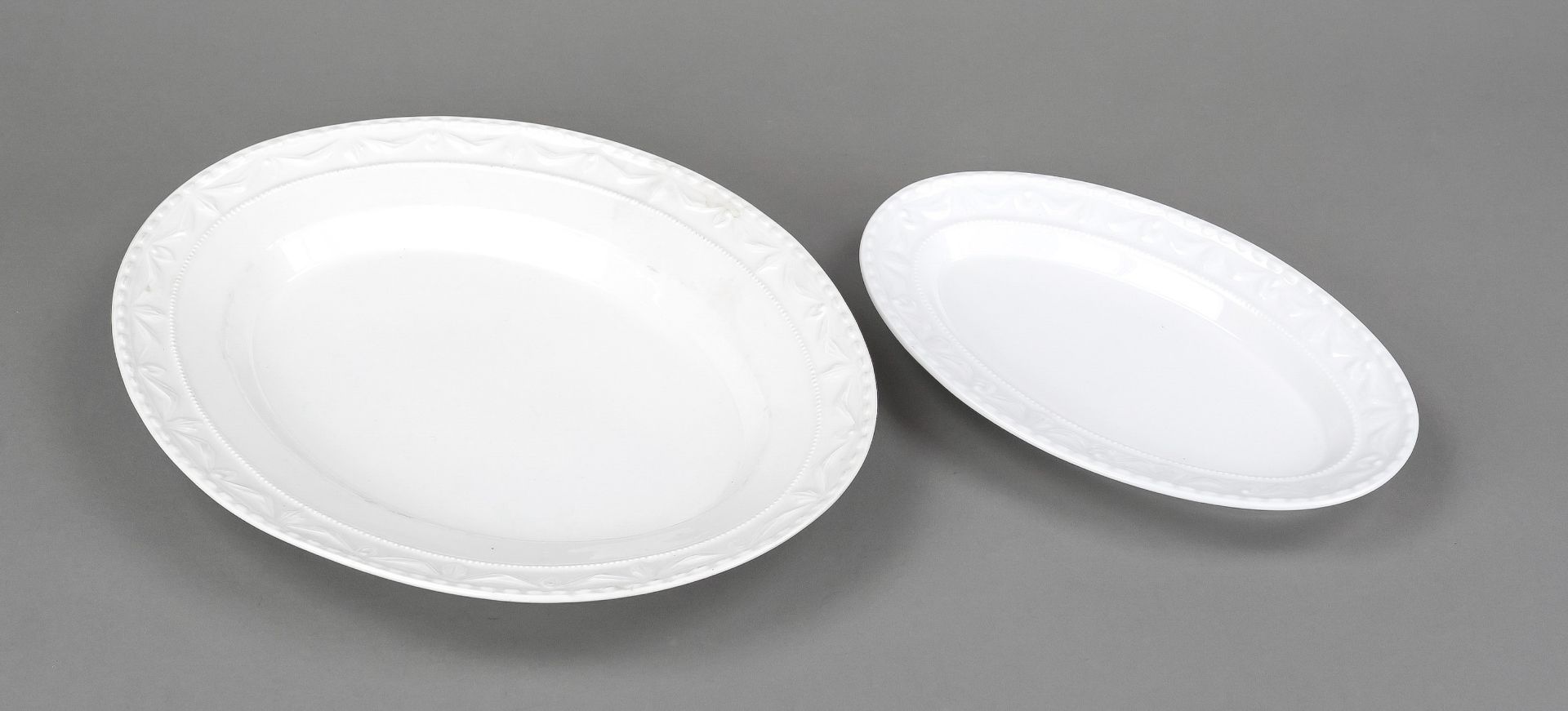 Two oval serving platters, KPM Berlin, marks 1870-1945 and after 2000, 1st and 2nd choice, Kurland