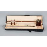 Musical instrument China, 20th century, stringed instrument with bow, wood and bone, with case, l.