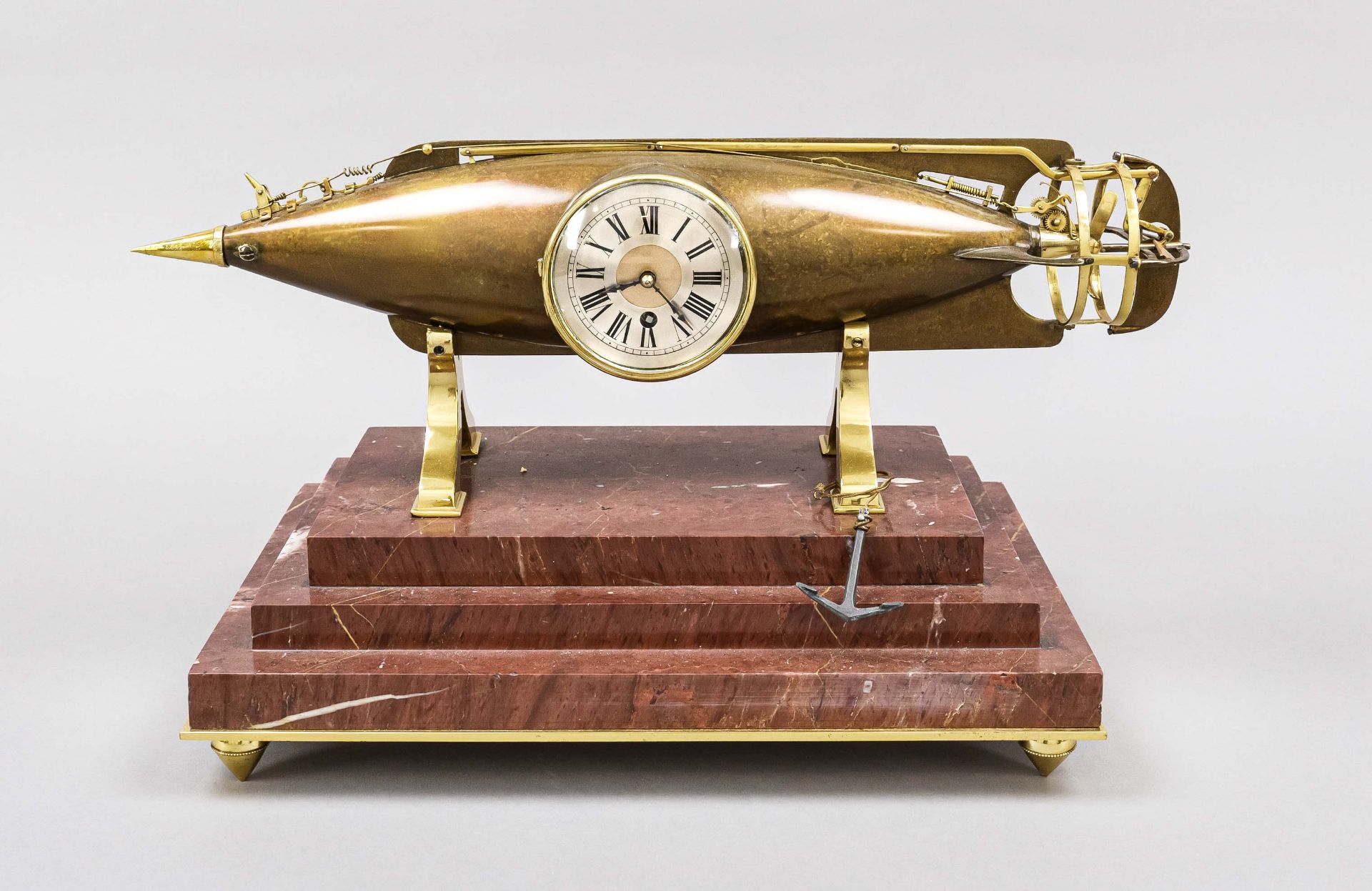 Industrial table clock, probably France, late 19th century, brass replica of a torpedo, partly