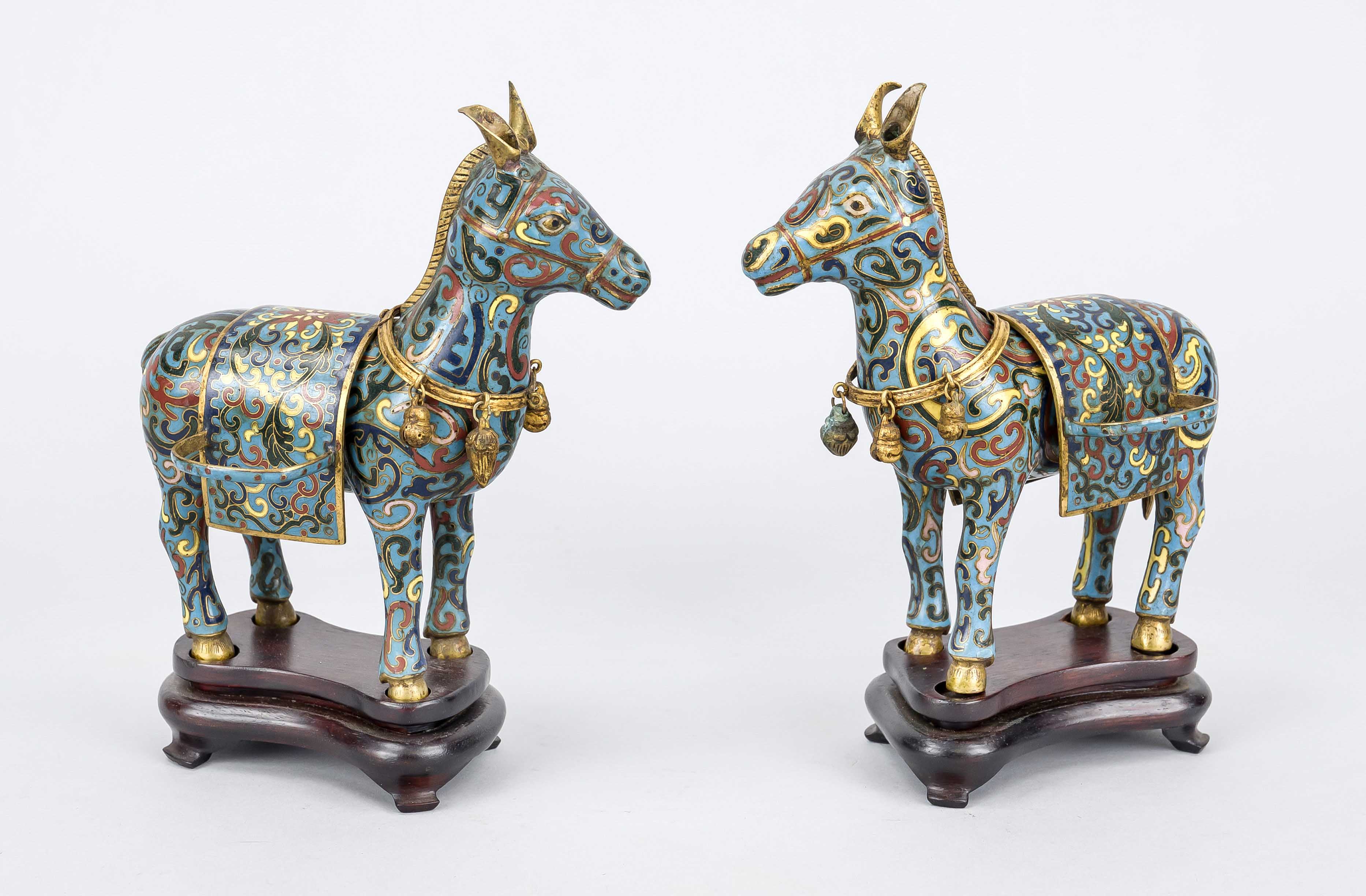 A pair of cloisonné censers/covered vessels, China 19th century (Qing). Standing donkeys with saddle