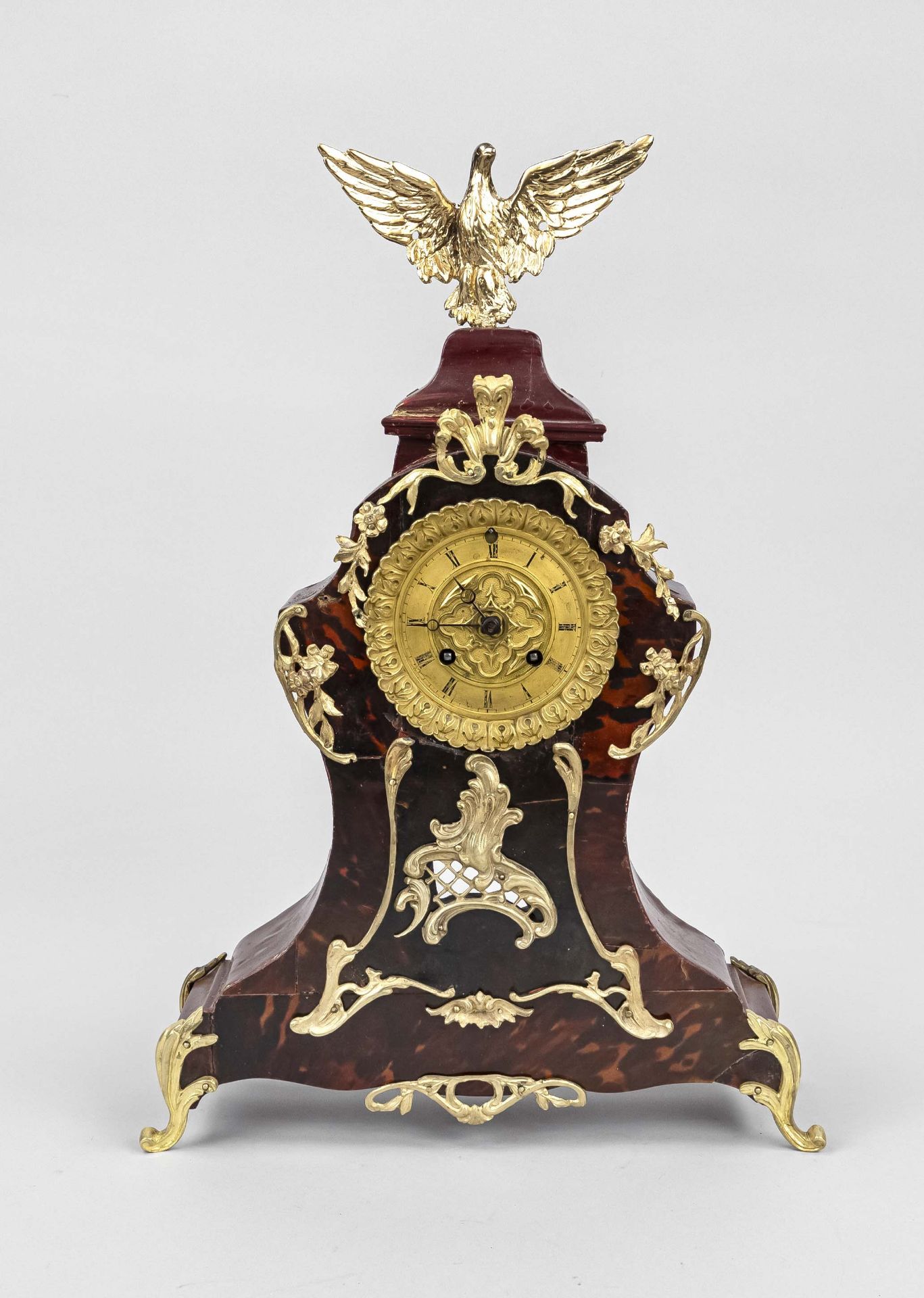 Table clock with red wood, the front covered with tortoiseshell and decorated with floral gilt