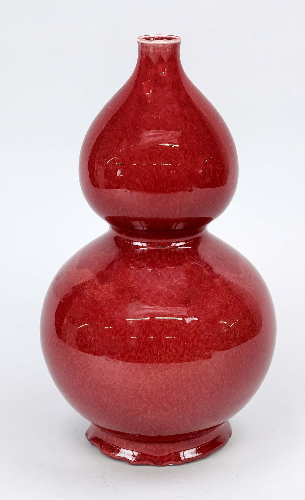 Monochrome double gourd vase, China 19th century (Qing). Balustrated body with oxblood-colored