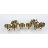 2 sconces, each with 3 flames, 19th century, brass. Swivel arms with acanthus leaf decoration