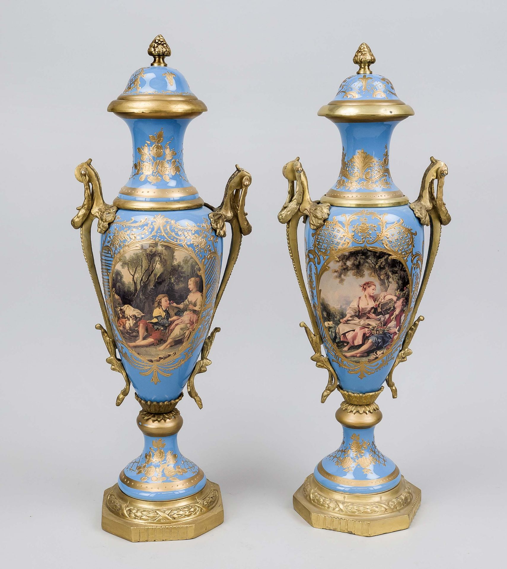 Pair of Sèvre-style ceremonial vases, 20th century Light blue-round lidded vase with bronze
