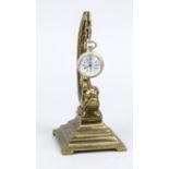 Brass pocket watch stand in the shape of a fish, with a silver-plated pocket watch, h. 17cm