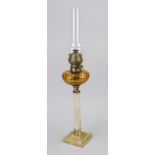Petroleum lamp, late 19th century. Marble column shaft on an ornamented base. Tank of brown glass,