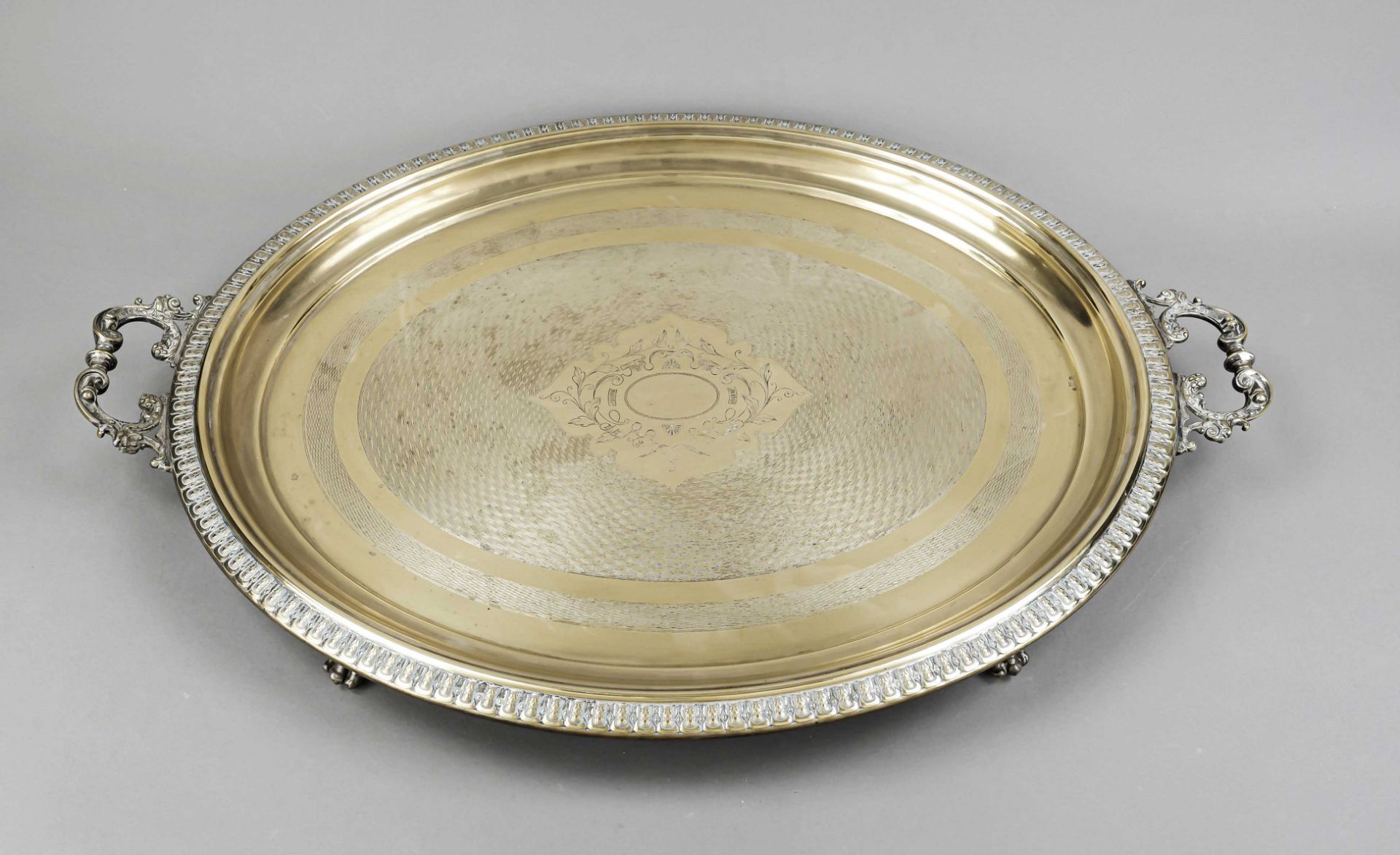 A very large oval tray, German, c. 1900, maker's mark WMF, Geislingen, ostrich mark, plated, on 4