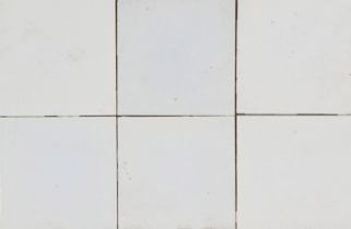 78 Tiles, early 20th century, monochrome white, slightly rubbed & chipped, each 13 x 13 cm