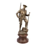 J. Guillot, late 19th century, Alpine hunter, brown patinated cast metal over a marbled wooden base,