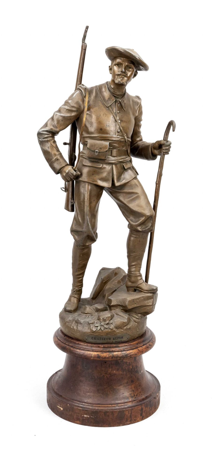 J. Guillot, late 19th century, Alpine hunter, brown patinated cast metal over a marbled wooden base,