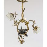 Ceiling lamp, late 19th century, floating putto surrounded by shrubs and leaves, 2 of 3 sockets with