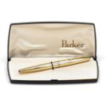 Parker converter fountain pen, 2nd half 20th century, gilded nib, gilded and black case, l. 13.8 cm,
