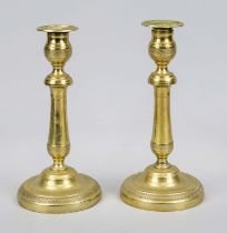 Pair of candlesticks, c. 1800, brass/bronze-gilt, round base, fluted shaft (1 x burnt and restored),