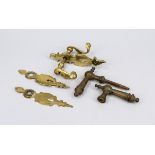 2 door handle sets from around 1900, brass, various shapes, l. approx. 22 cm