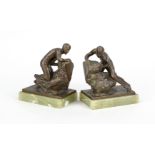 Bruno Zach (1891-1935), pair of figurative bookends in the shape of miners, brown patinated bronze