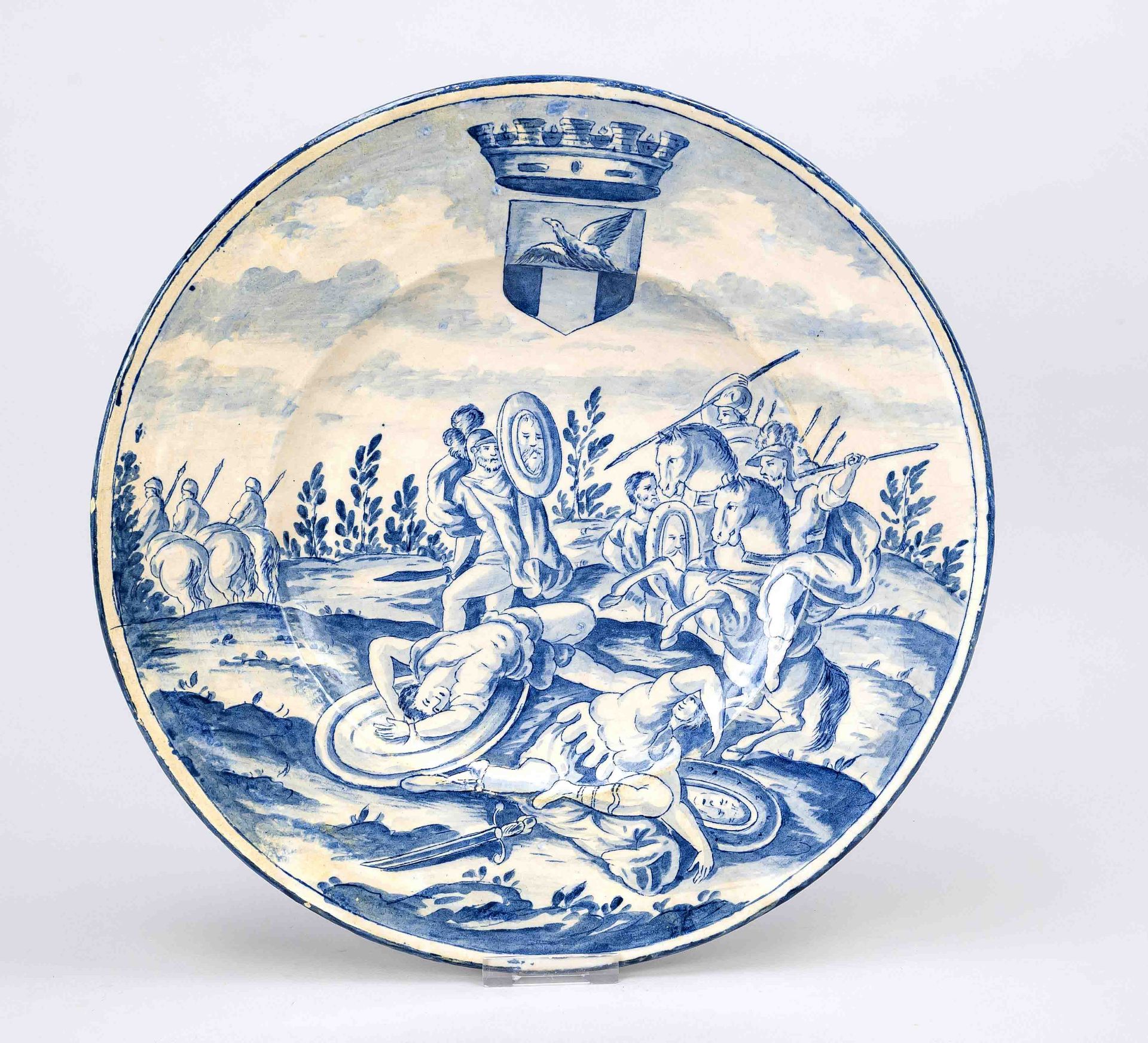 Faience plate, Holland 19th century, glazed, blue painted with a battle scene in antique style,