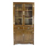 Asian display cabinet, 20th century, typical ash-like solid wood, two doors below, two drawers in