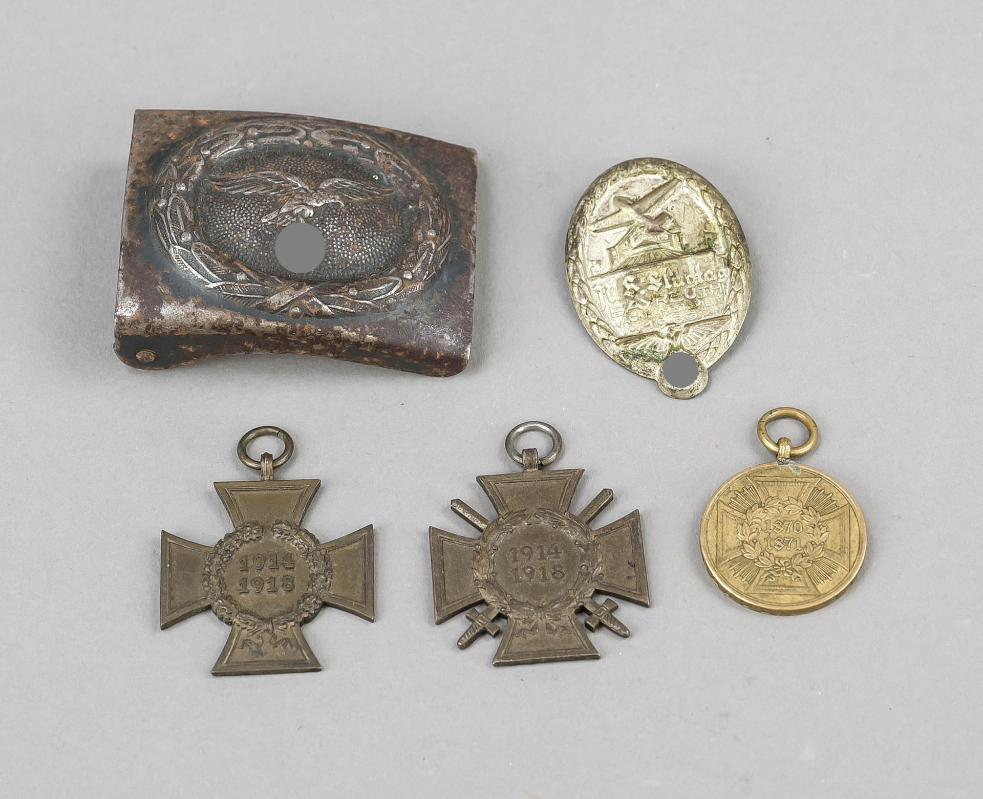 Luftwaffe belt buckle and 4 medals or badges, 1st half of the 20th century Iron belt buckle,