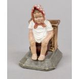 Humorous match holder, late 19th century, polychrome painted stoneware. Girl on a chamber pot in