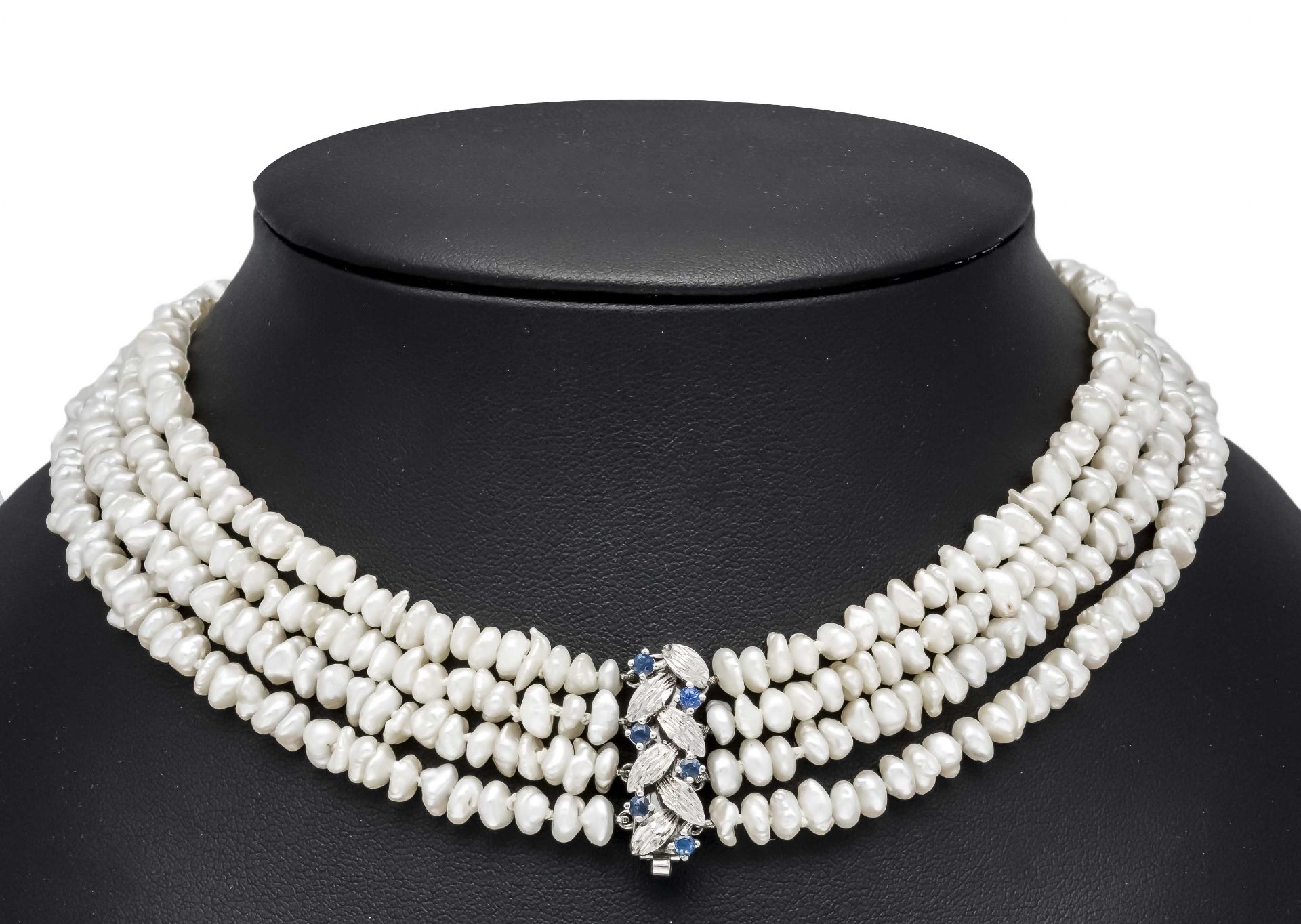 4-row freshwater pearl necklace with box clasp WG 585/000 set with 6 round faceted blue gemstones