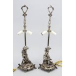 Pair of figural lamps, France 1st half 20th century, marked Christofle, silver-plated. Base as a boy