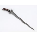 Kris Indonesia, 19th/20th century, flamed iron blade, carved dark wood handle, rubbed, l. 41 cm