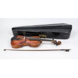 Violin in a case, probably late 19th century, violin unmarked, bow unstrung. Wooden violin case with