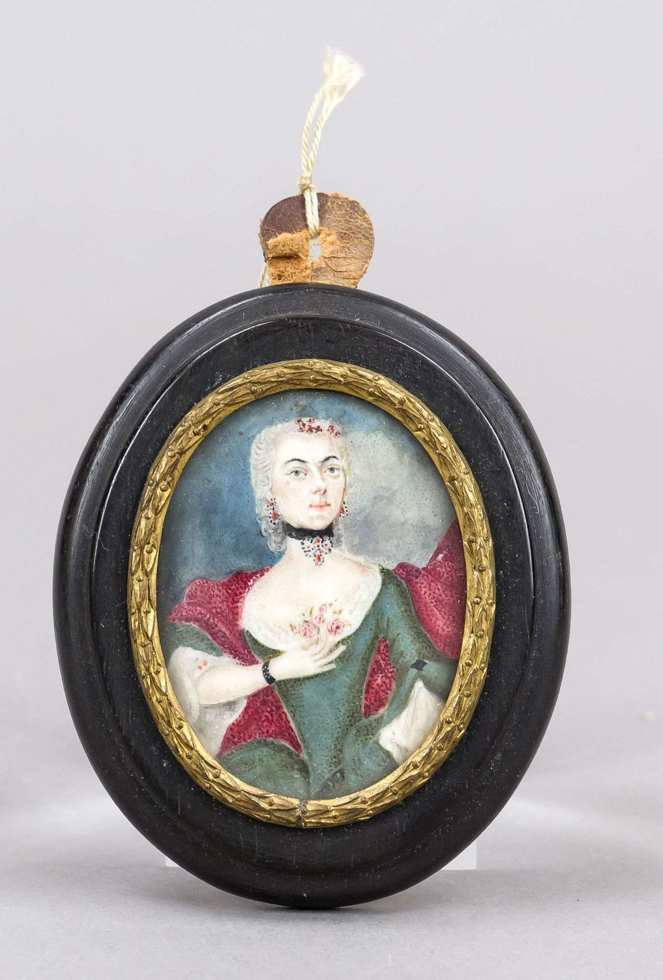 Oval miniature, German c. 1750, polychrome tempera painting on bone plate. A young Rococo woman in