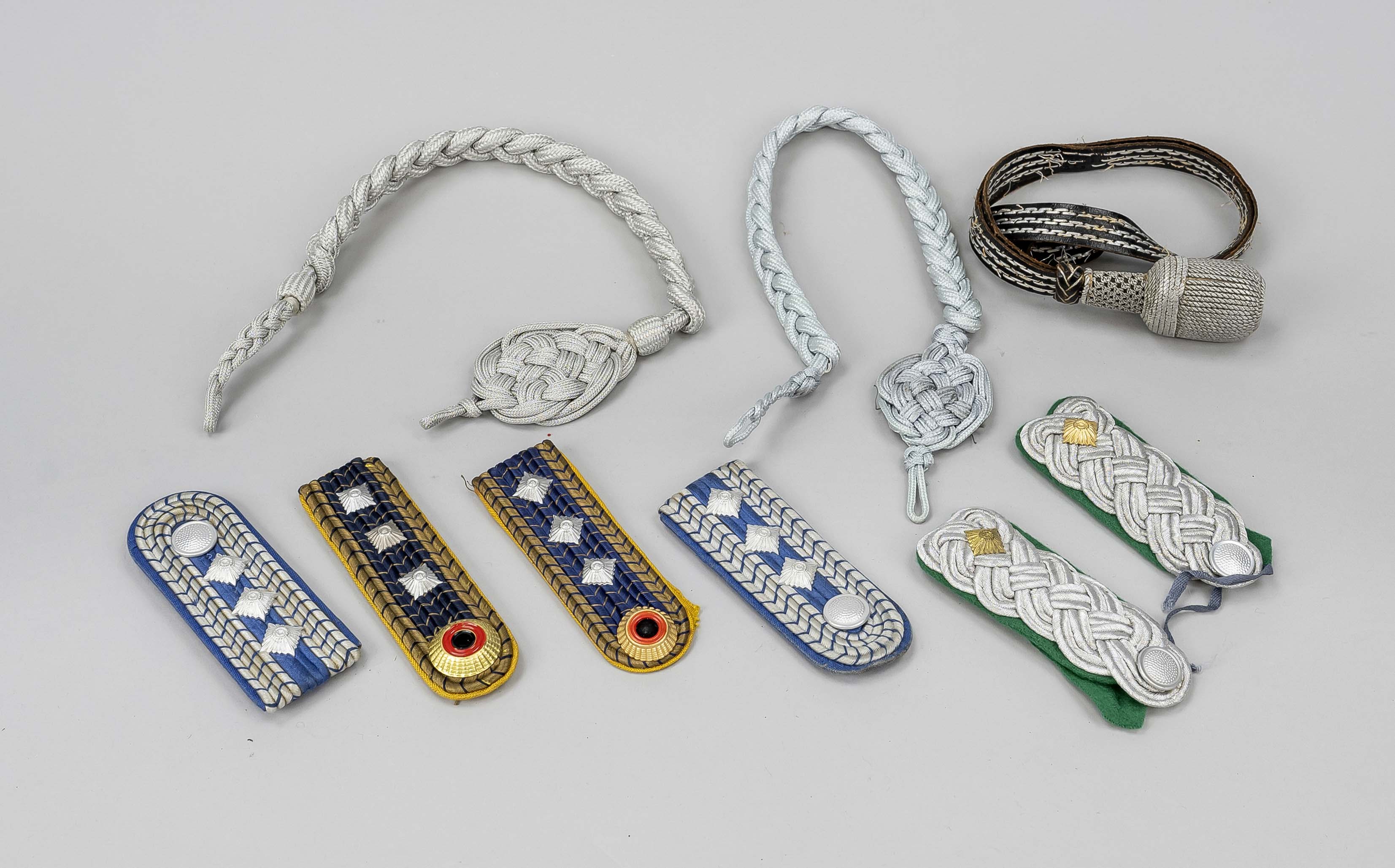 Konv Schützenschnüre and epaulettes, 20th century, fabric and metal. 3 pairs of epaulettes, 2