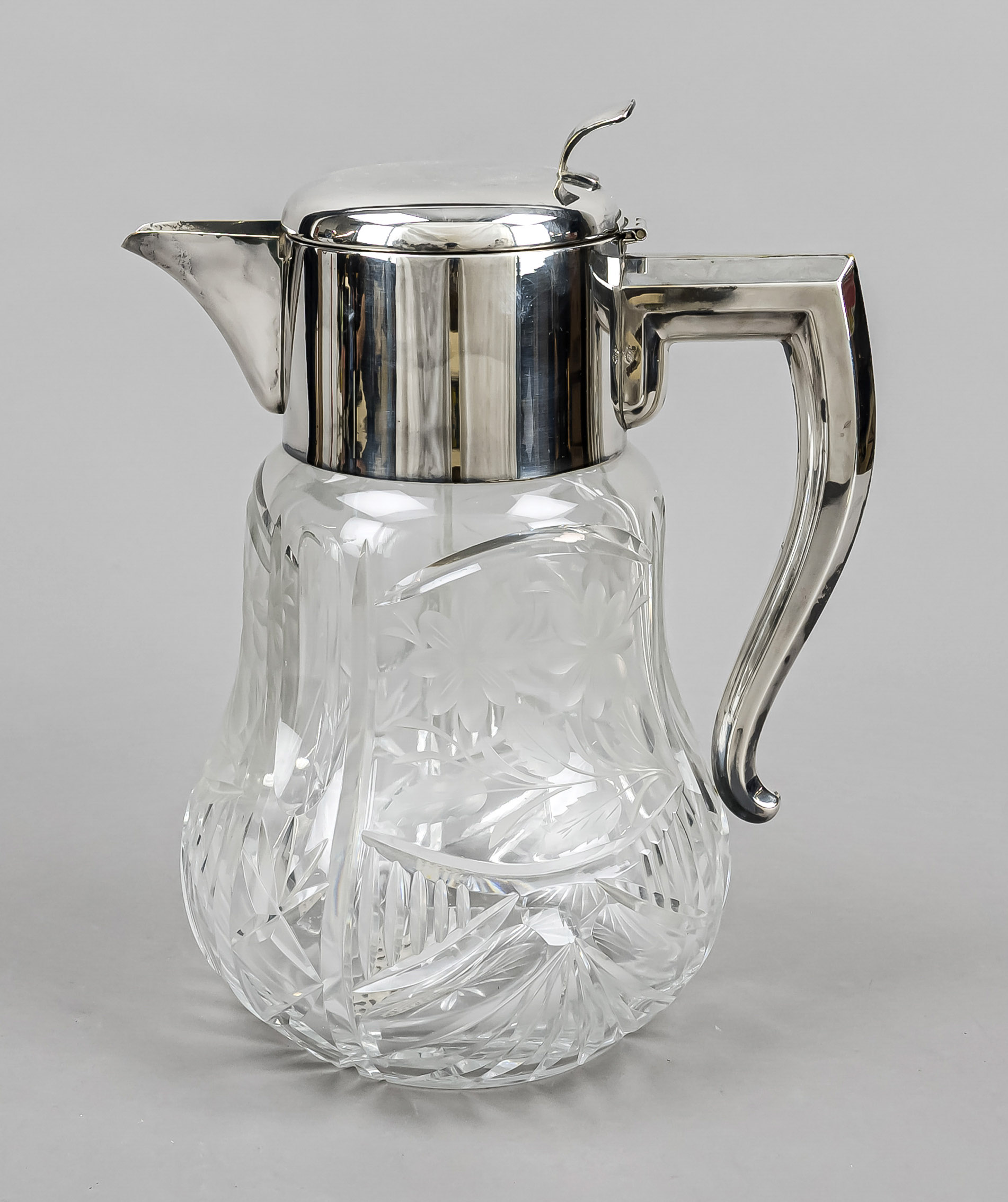 Large juice jug, 20th century, mounting plated, clear glass body, with rich cut decoration, strainer