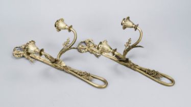 Pair of wall sconces, each with 2 flames, 19th/20th century, gold-bronzed brass. Curved sconce
