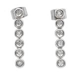 Brilliant stud earrings WG 585/000 with 12 brilliant-cut diamonds, total 0.05 ct W/VS-SI, l. 24