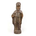 18th century figure of a saint, wood with remains of old paint, painted brown, arms missing, heavily