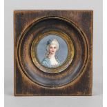 Round miniature, French 19th century, polychrome tempera painting on bone panel. A young woman