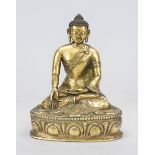 Buddha, China/Tibet probably 19th century, fire-gilt bronze. Sitting in padmasana on a lotus base,