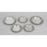 Five coasters, 20th century, various makers, silver 800/000 or 835/000, various decorations, each