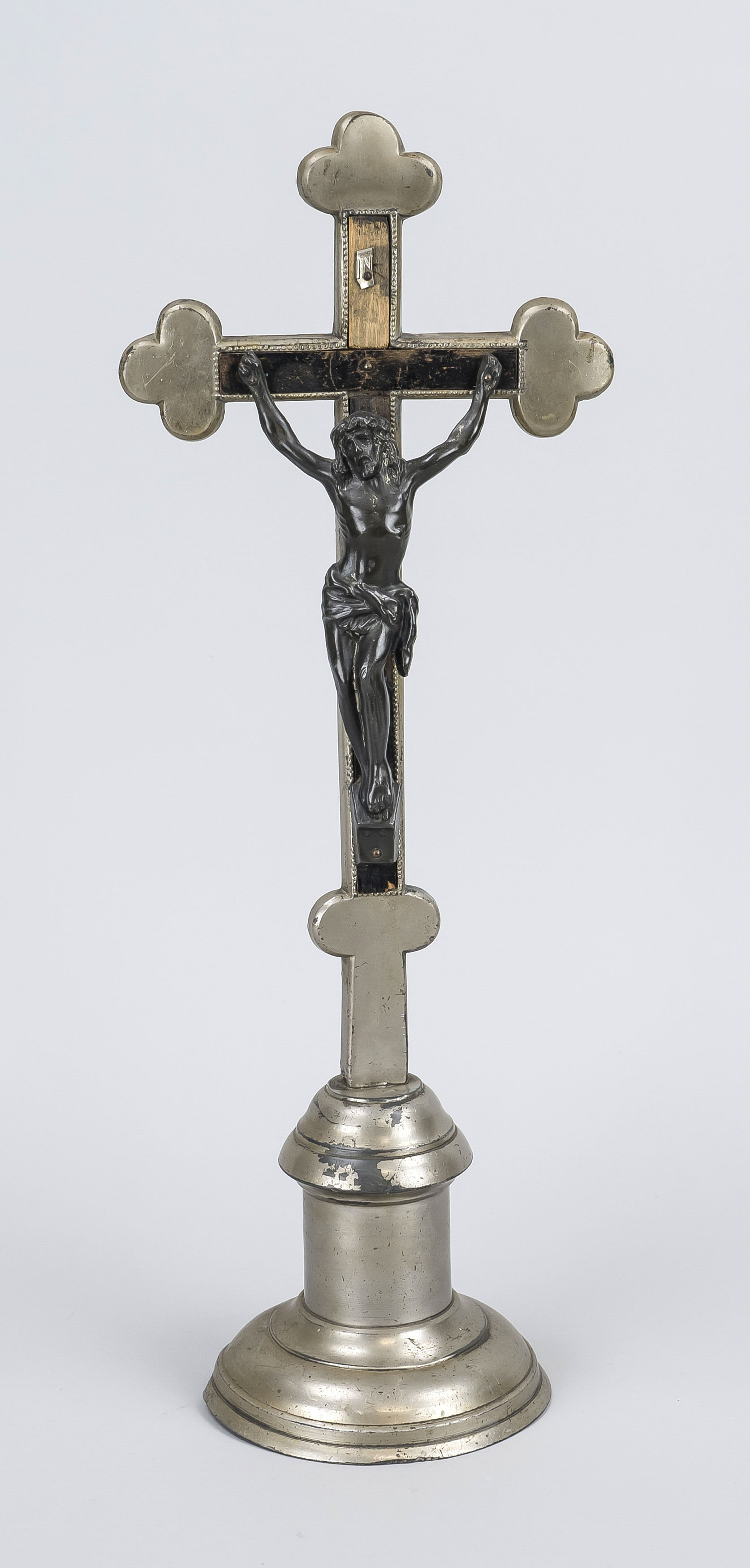 Crucifix, 19th century, multi-colored cast metal and wood, three-nail type, h. 47 cm