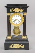 Portalu clock, 2nd half 19th century, ebonized wood, with gilded bases and capitals, gilded bronze