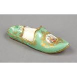 Decorative slipper, probably Meissen, 19th/20th century, front medallion with polychrome painting,