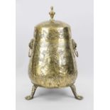 Urn, Holland 19th century, brass. Slightly conical container on 3 paw feet, ring handles on lion